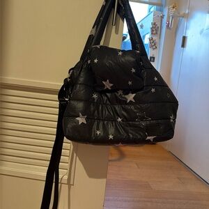 7am Enfant Voyage bag with black stars